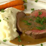 Savoring Classic Roast Beef with Creamy Gravy & Mash