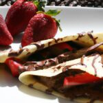 Decadent Chocolate Crêpes Filled with Fresh Strawberries
