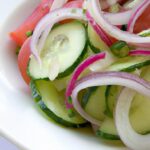 Refreshing Cucumber Salad with Tomato and Red Onion Twist