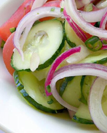 Refreshing Cucumber Salad with Tomato and Red Onion Twist