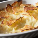 Golden Scalloped Potatoes with Creamy Gruyère Cheese Bliss