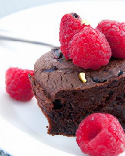 Decadent Flourless Chocolate Cake with Tangy Raspberry Sauce