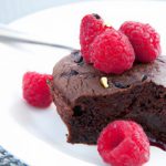 Decadent Flourless Chocolate Cake with Tangy Raspberry Sauce